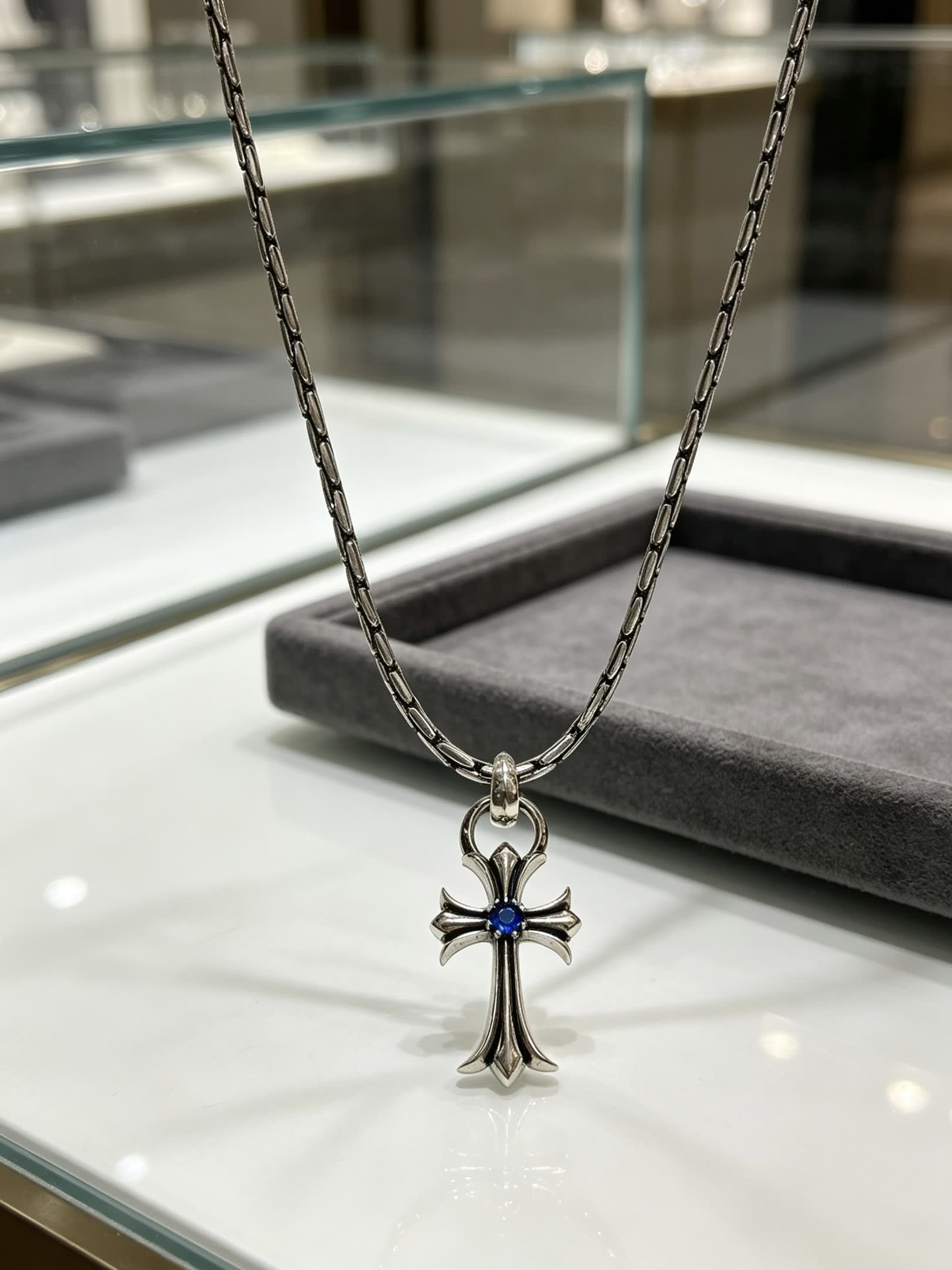 Chrome Hearts Silver Cross Pendant with Blue Gemstone
